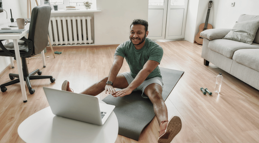 Patient performing guided home exercises from chiropractor to improve mobility